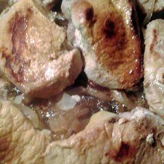 A picture of apple stuffed pork chops.