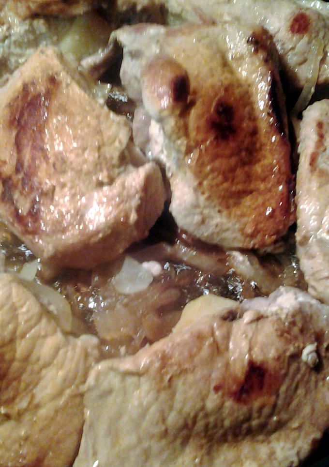 A picture of apple stuffed pork chops.