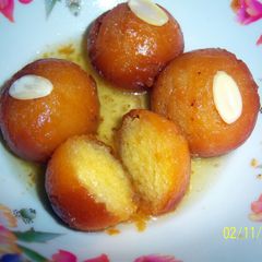 A picture of Sobzee's indian Gulab jamun (doughnut like balls soaked in syrup.