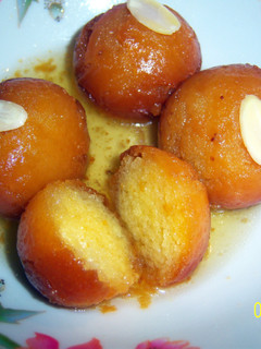 A picture of Sobzee's indian Gulab jamun (doughnut like balls soaked in syrup.