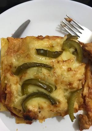 A picture of Lasagna with chicken.