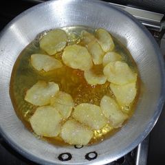 A picture of Homemade potato crisps.