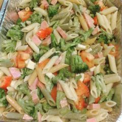 A picture of My Famous Tri Color Pasta salad with Ham and Cheese and Veggies.