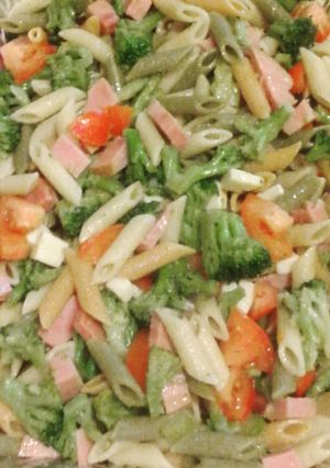 A picture of My Famous Tri Color Pasta salad with Ham and Cheese and Veggies.