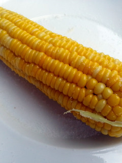 A picture of Corn On The Cob With Butter And Salt.