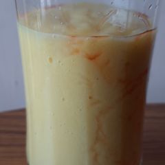 Mango shake with strawberry syrup A picture of Mango shake with strawberry syrup.