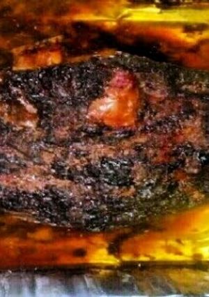 A picture of Roasted Pork Shoulder (Pernil).