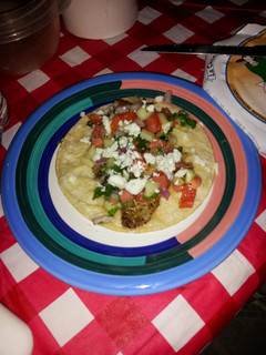 A picture of Fish tacoz w/cucumber Pico de gallo.