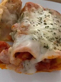 Una foto de Canelones con zanahoria y verduras varias