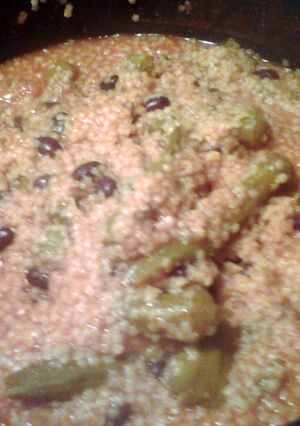 A picture of pastina, okra and tomato sauce.
