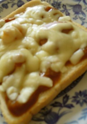 A picture of Last Night's Curry is This Morning's Cheese Toast.