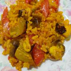 Una foto de Arroz con chipirones y setas