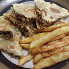 A picture of Bacon cheeseburger quesadillas.