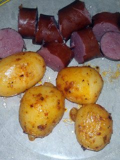 A picture of Turkey kielbasa and spicy potatoes.
