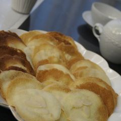 A picture of Our Family's Secret Recipe for Almond Tuiles.