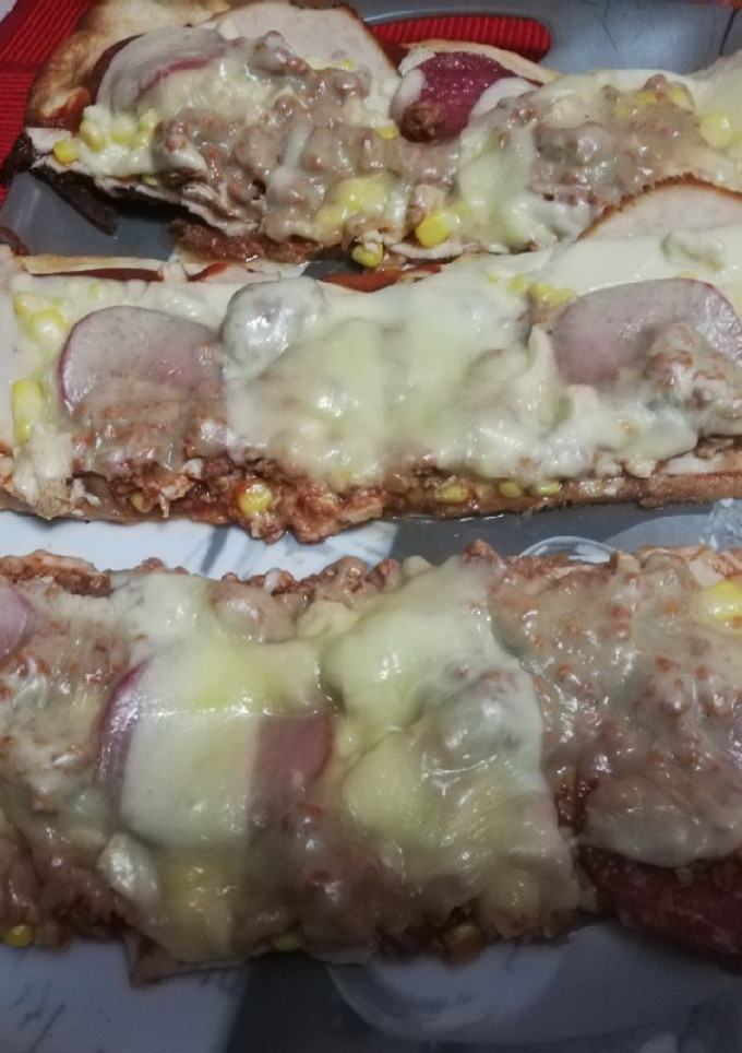 Una foto de Pizza de mi mamá