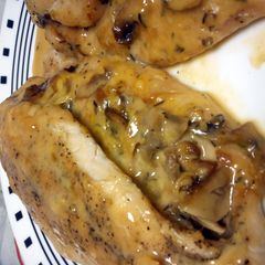 A picture of stuffed cheese baked chicken.
