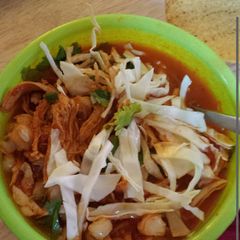 A picture of Red chicken pozole.