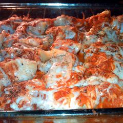 A picture of shells stuffed with sausage, spinach & garlic.
