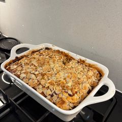 A picture of Almond Croissant Style High Protein Baked Oats with Pears.
