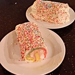 A picture of Rainbow Sherbet ( Sorbet ) Filled Striped Vanilla Cake Roll.