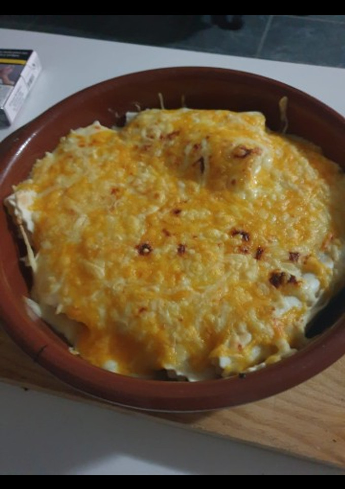 Una foto de Canelones de merluza