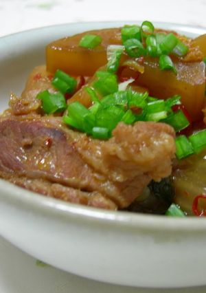 A picture of The Meat is Fall-Apart Tender! Daikon Radish and Spareribs Simmered with Kimchi.