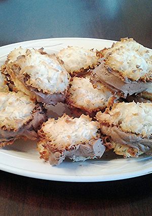 A picture of Coconut Macaroon Chocolate Cream filled Sandwich Cookies.