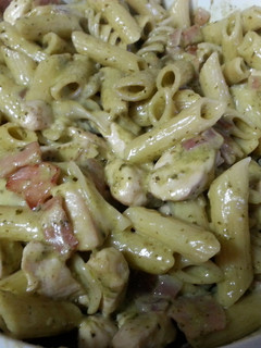 A picture of Creamy pesto pasta with camembert bacon and chicken.