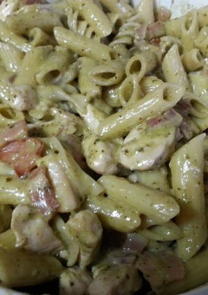 A picture of Creamy pesto pasta with camembert bacon and chicken.