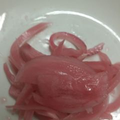 A picture of Pickled Red Onions.