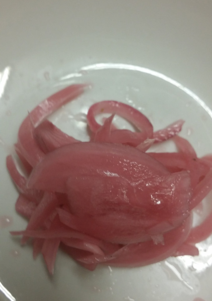 A picture of Pickled Red Onions.