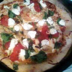 A picture of Spinach & roasted pepper Pizza.