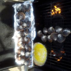A picture of Grilled Clams with white wine, butter & garlic.