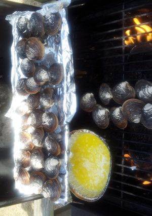 A picture of Grilled Clams with white wine, butter & garlic.