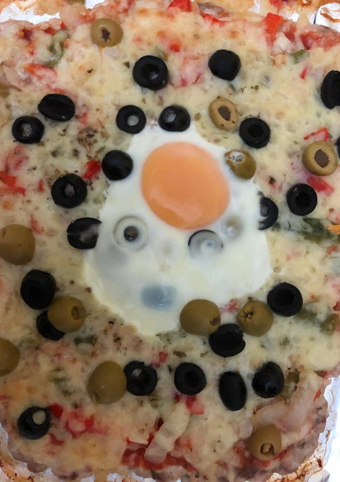 Una foto de Pizza base de pollo