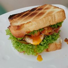 A picture of Spicy Garlic Buttered Shrimp And Egg Sandwich.