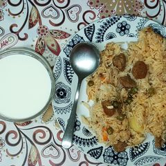 A picture of Vegetable Soya and Coconut pulav in the Pressure Cooker.