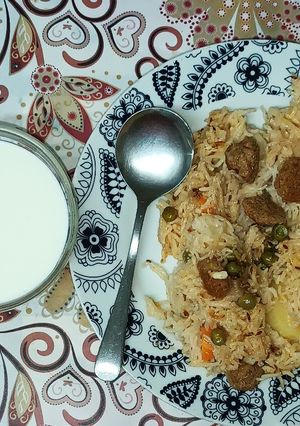 A picture of Vegetable Soya and Coconut pulav in the Pressure Cooker.