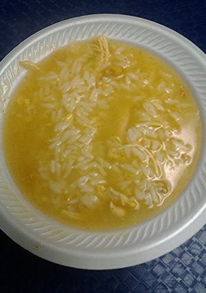 A picture of Annatto chicken and rice stoup.
