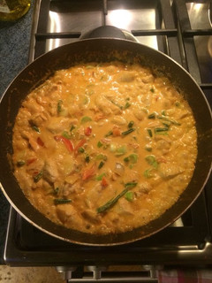 A picture of Thai red curry with chicken.