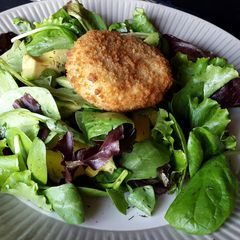 A picture of Hadock fishcake & avocado Salad.