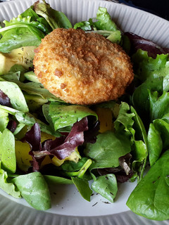 A picture of Hadock fishcake & avocado Salad.