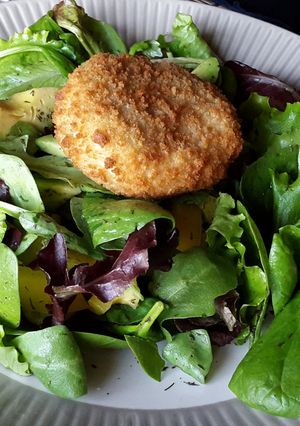 A picture of Hadock fishcake & avocado Salad.