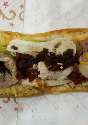 A picture of 3 way Xmas leftovers sandwich.