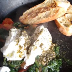 A picture of Pesto Butter Poached Eggs & garlic oil toast.
