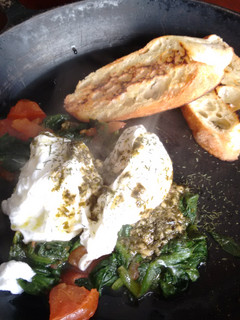 A picture of Pesto Butter Poached Eggs & garlic oil toast.