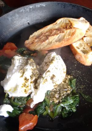 A picture of Pesto Butter Poached Eggs & garlic oil toast.