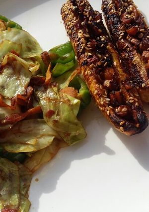 A picture of Baked plantain and cabbage stir fry.