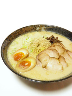 A picture of Thick and Rich Miso Tonkotsu (Pork Base) Ramen Noodles.